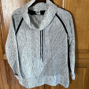 Cowl neck in fun black and white pattern.